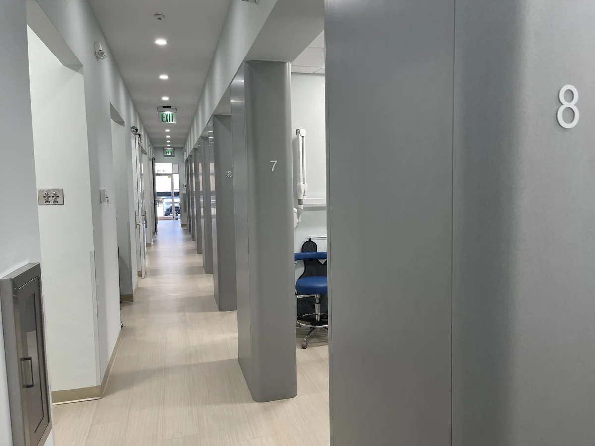 Corridor to the treatment rooms at the Dental Options North Miami office