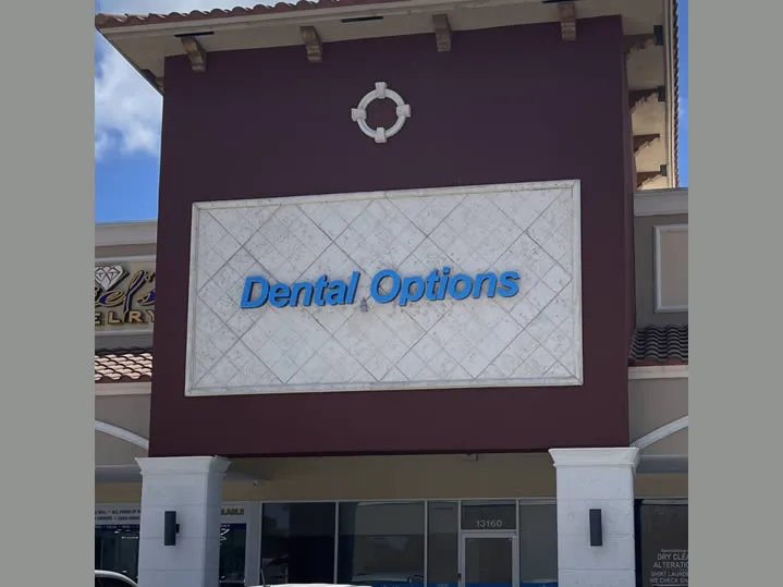 Dental Options signage on the building front at the North Miami dental office