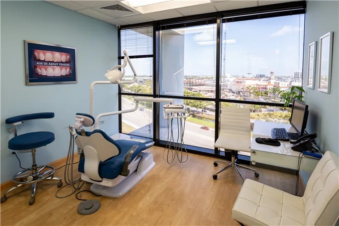 Treatment room with a city view at the Dental Options Aventura office